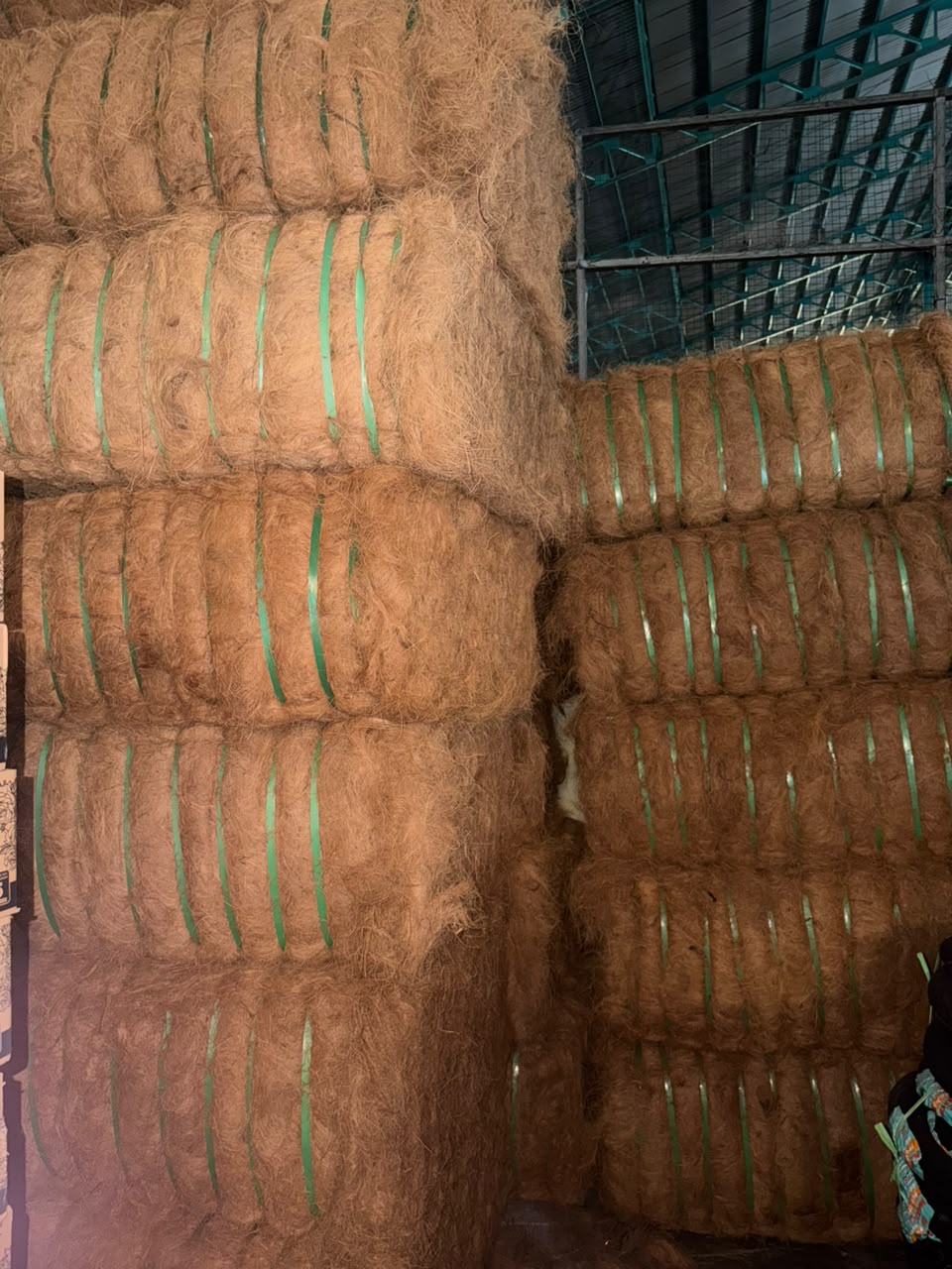 Compressed cocofiber bales in storage