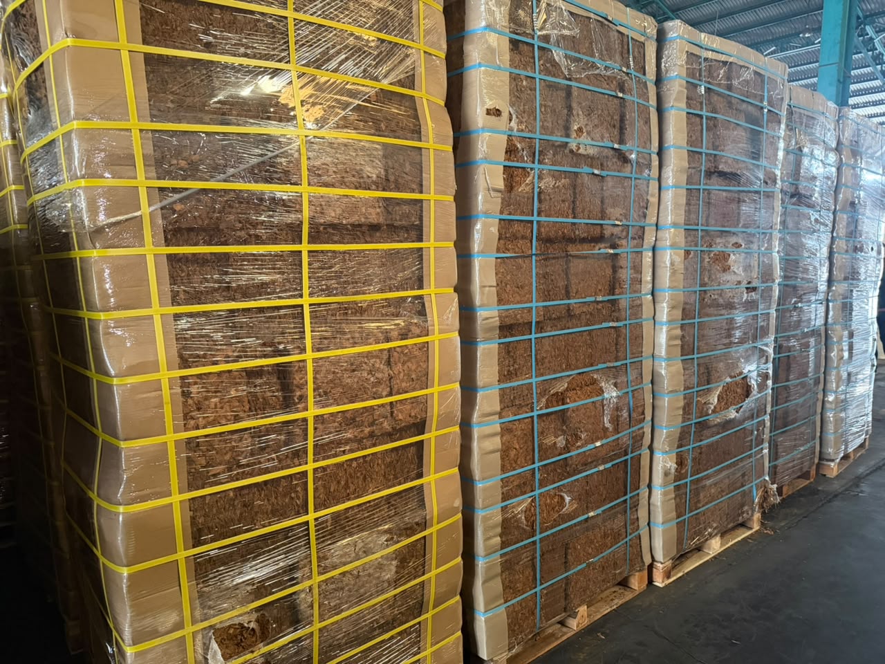 Palletized coconut products prepared for export